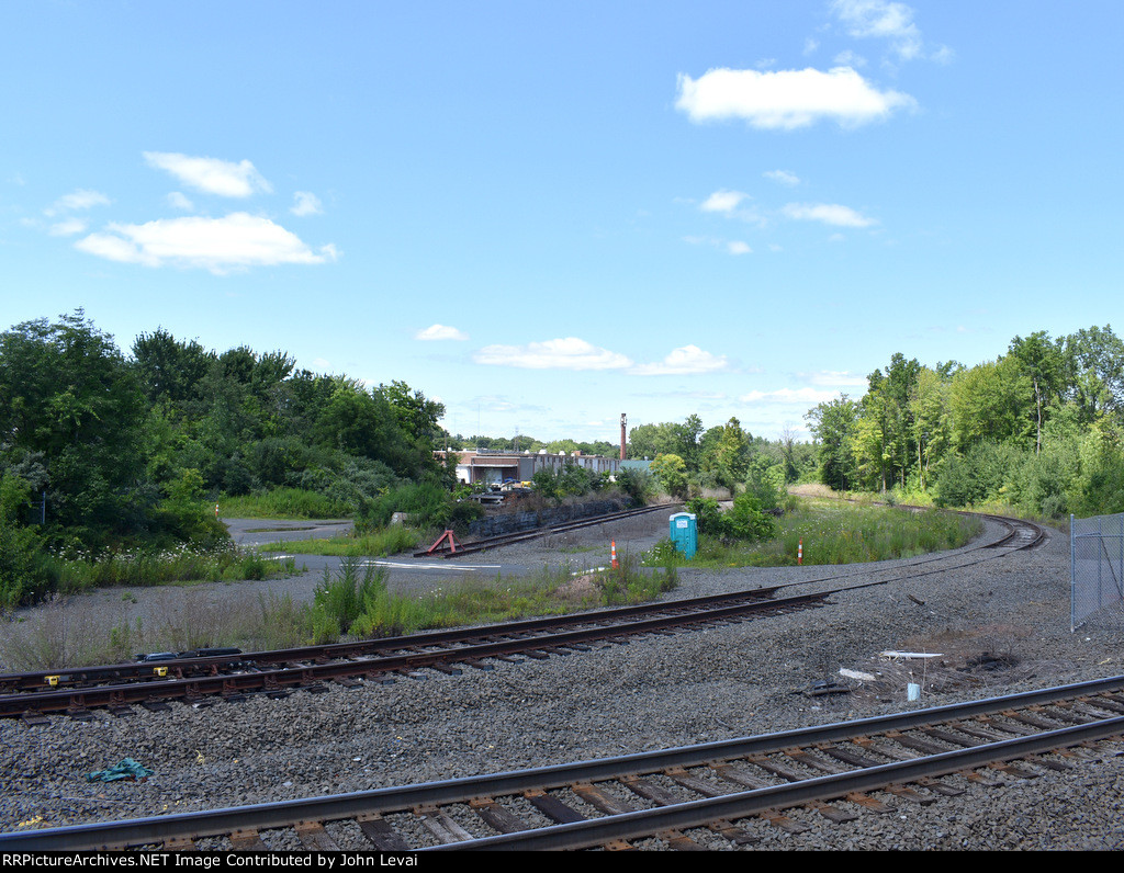 This is a Pan Am operated right of way veering off from Amtraks Springfield Line. I think the Pam Am line here goes to Plainville.